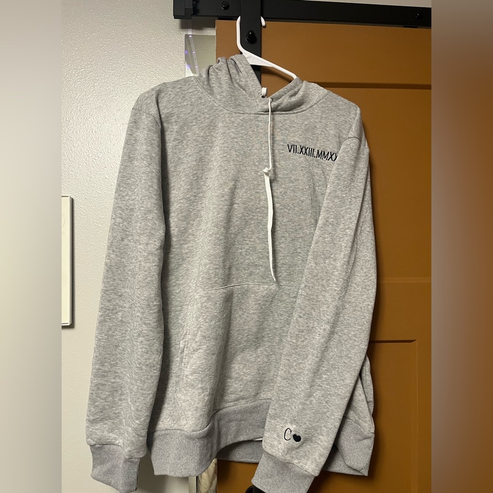 Grey hoodie (never worn)